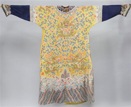 A Chinese Imperial yellow silk dragon robe, Jifu, 19th century, length 140cm